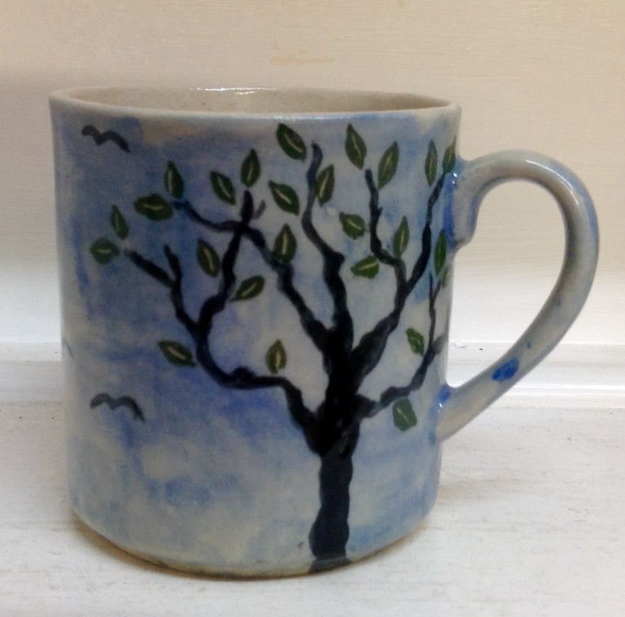 Mug in pottery stoneware with tree design