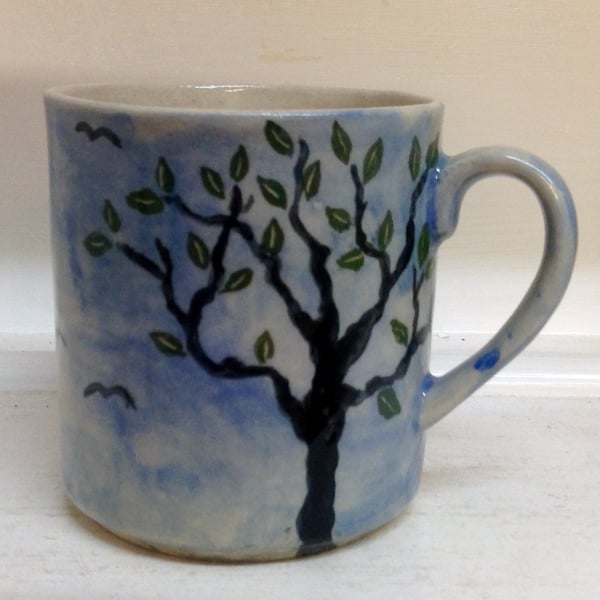 Mug in pottery stoneware with tree design