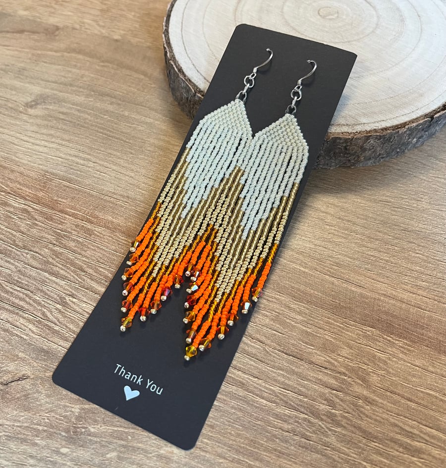 Long orange and cream Swarovski beaded fringe earrings 