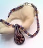Purple Floral Patterned Glass Pendant on a Mixed Purple Crystal Necklace - Image 7