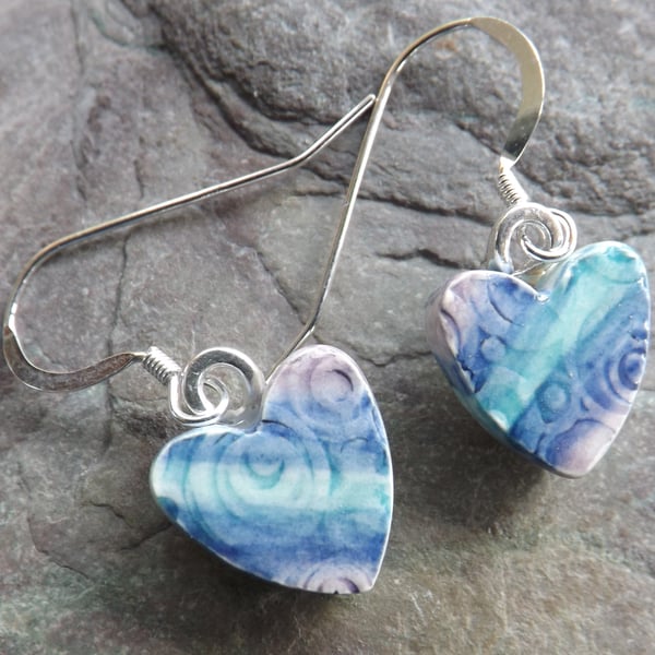 Handmade Heart-shaped ceramic drop earrings in turquoise blue and purple