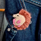 Crocheted hedgehog brooch 