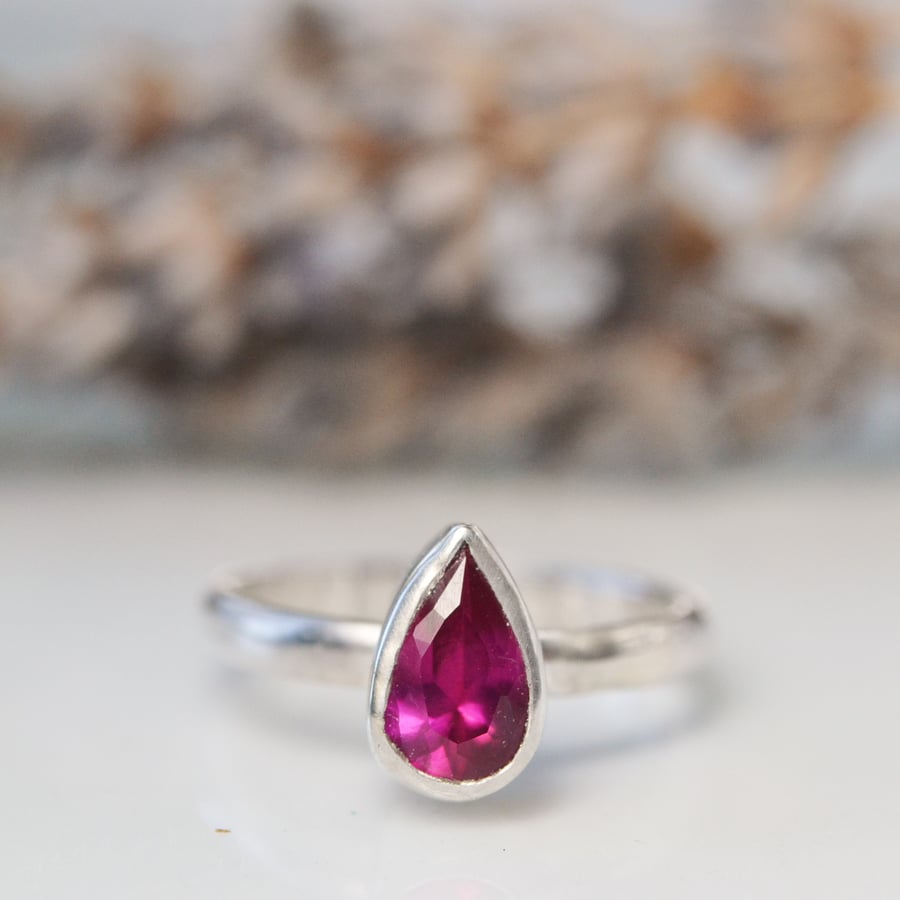 Ruby pear birthstone ring in sterling silver