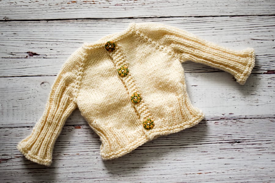 Hand Knitted cardigan in cream with floral buttons - newborn