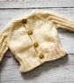 Hand Knitted cardigan in cream with floral buttons - newborn - Image 1