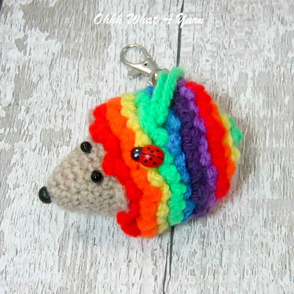 Crochet rainbow hedgehog decoration, scissor keeper, pin cushion, bag charm.