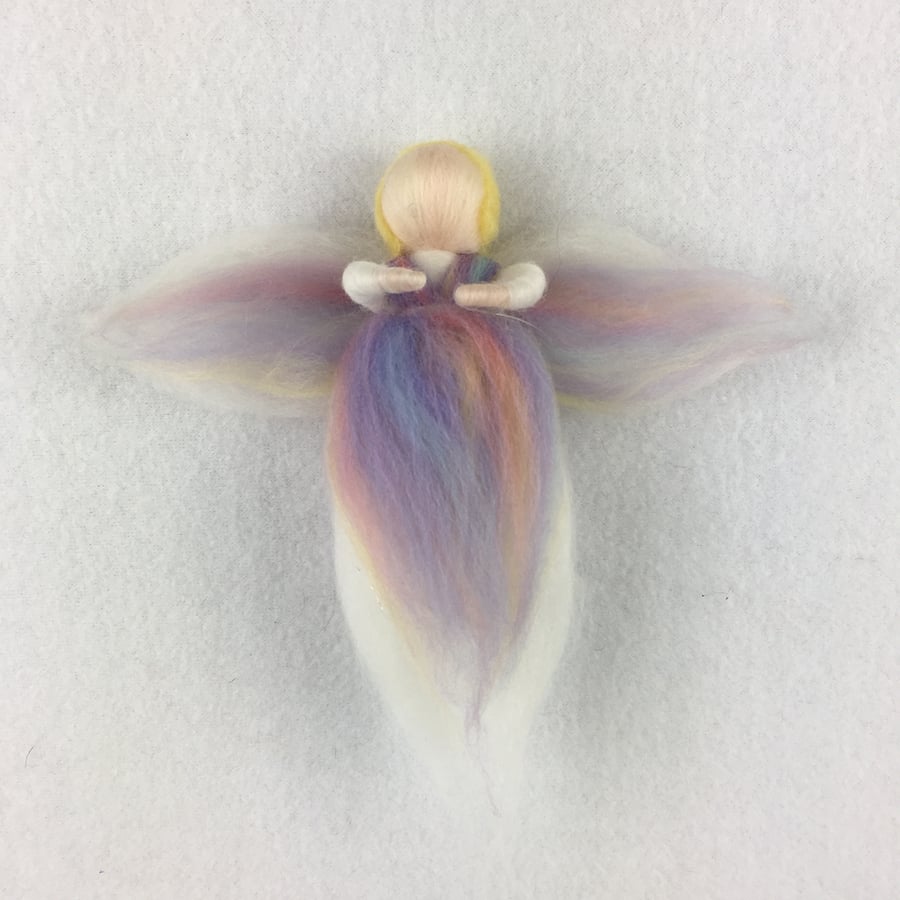 Fairy or angel in pastel (unicorn blend) merino wool fibres