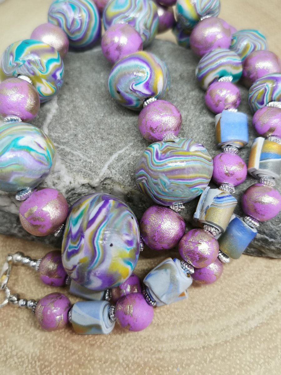 Striking marble effect handmade necklace. Handmade multi-coloured beads