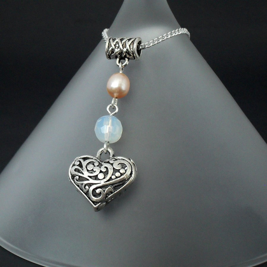 Peach pearl and moonstone heart charm necklace