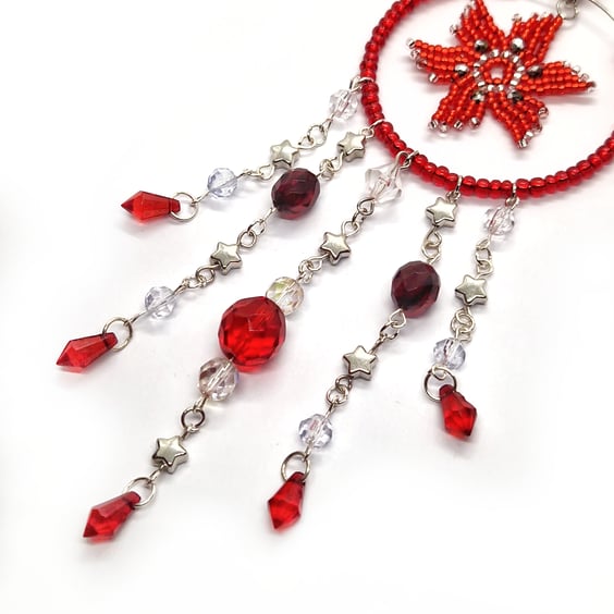 Red and silver poinsettia star beaded hanging decoration