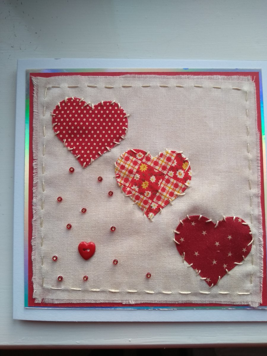 Trio of fabric hearts valentine's day card