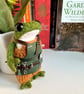 Handmade knitted frog