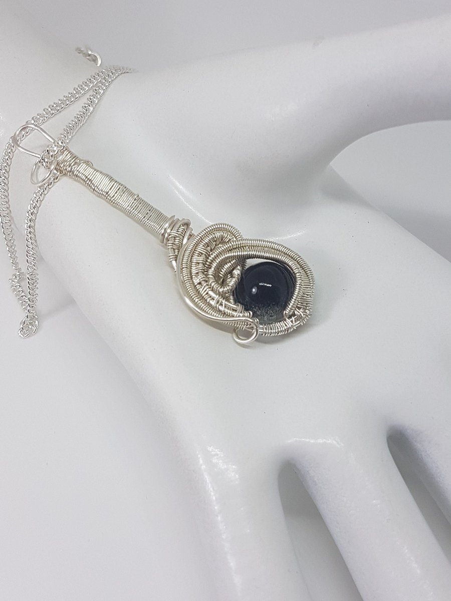 Wire wrapped Handmade pendant.