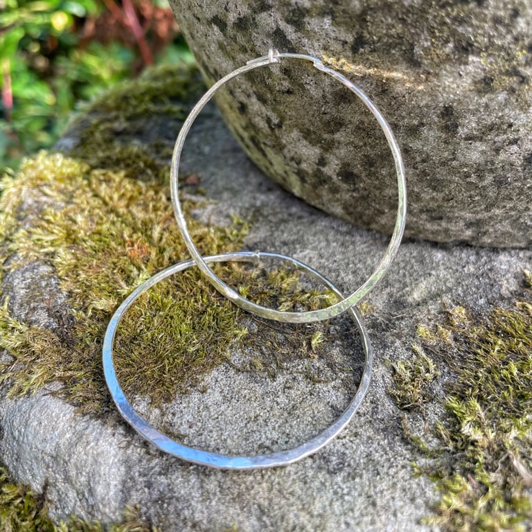 Large silver hammered hoop earrings