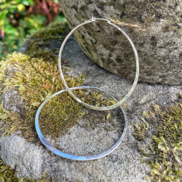 Large silver hammered hoop earrings