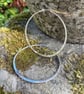 Large silver hammered hoop earrings - Image 1