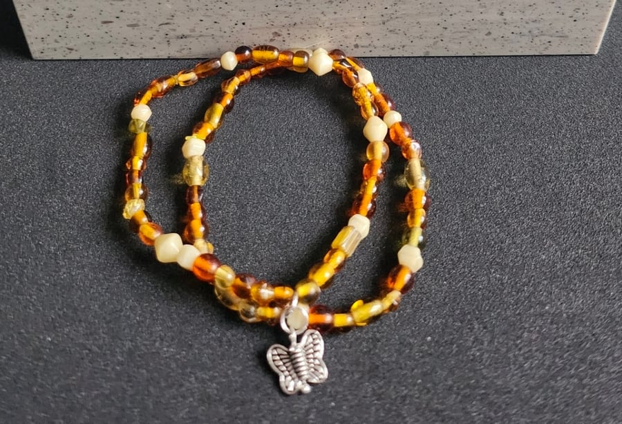 Brown Stacking Bracelet with a Butterfly Charm 