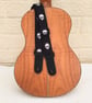 1 inch Wide Adjustable Ukulele Strap with Black and White Skulls - Image 1