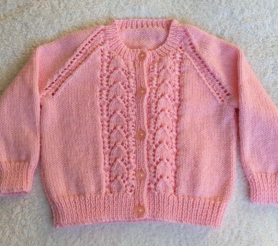 Hand knitted girls pink cardigan 