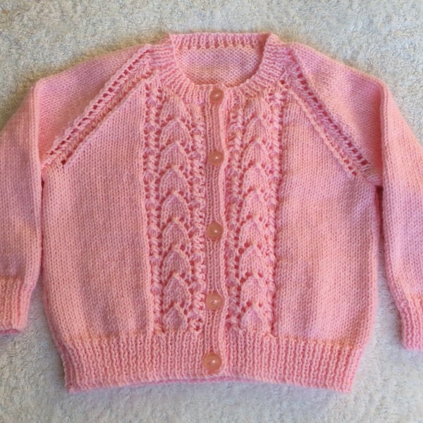 Hand knitted girls pink cardigan 