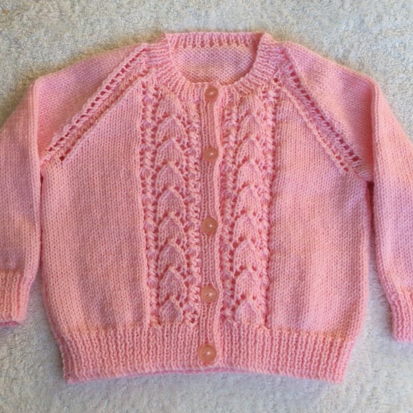 Hand knitted girls pink cardigan 