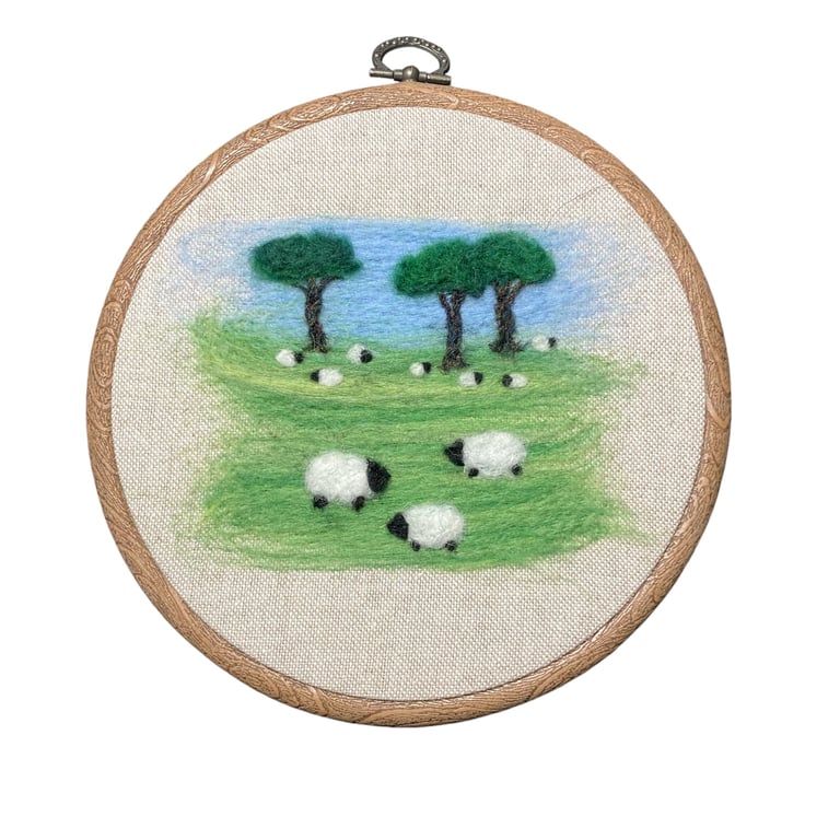 Sheep grazing in the fields, needle felted hoop art, Wool on linen