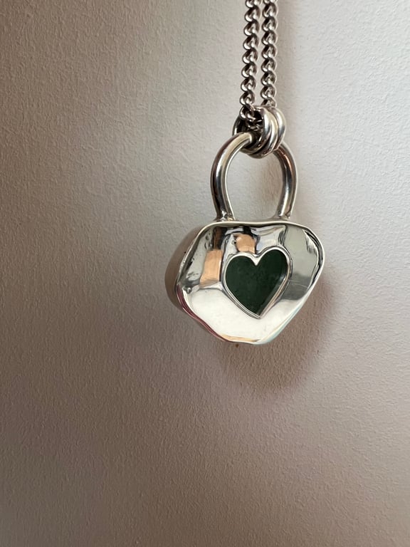 Stunning aqua sea glass set in a chunky sterling silver bezel