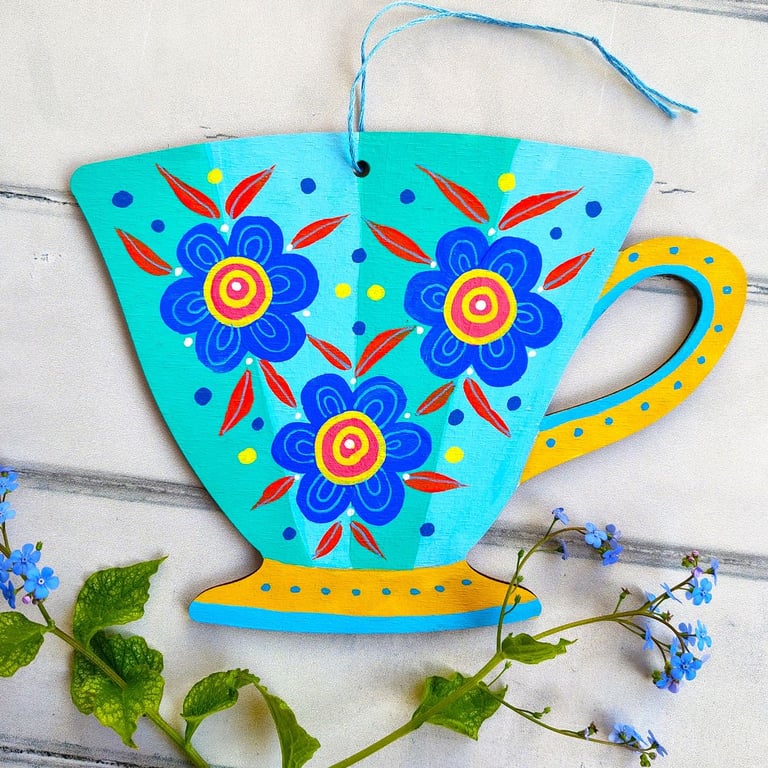 Wooden teacup hanging with blue green flowers for cottage core kitchen décor 