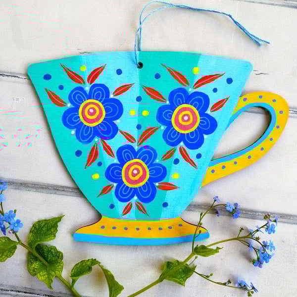 Wooden teacup hanging with blue green flowers for cottage core kitchen décor 