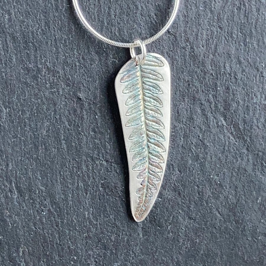 Silver fern pendant necklace