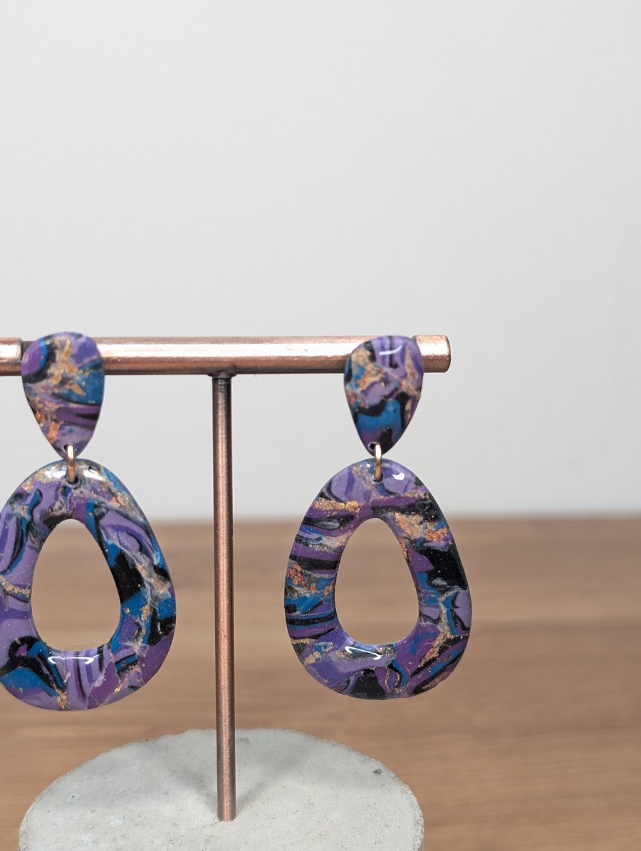 Yzma inspired  hollow pebble dangle earrings 