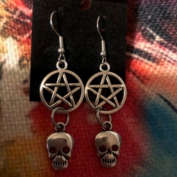 Dangly Pentagram earrings with skulls