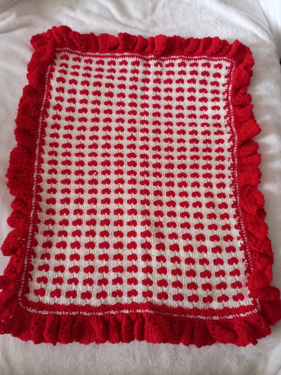 Hand crocheted red and white baby pram topper