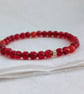 Red-orange faceted agate gemstone stretch bracelet  - Image 4