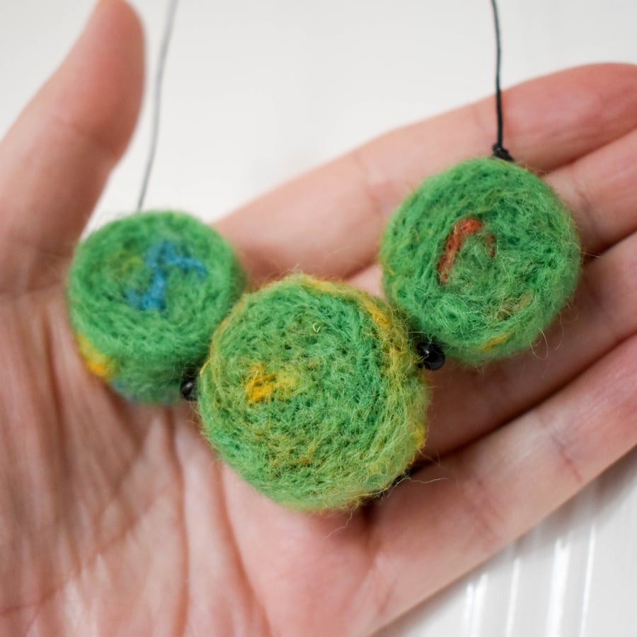 Felted bead necklace in green wool