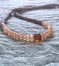 Grey and amber necklace