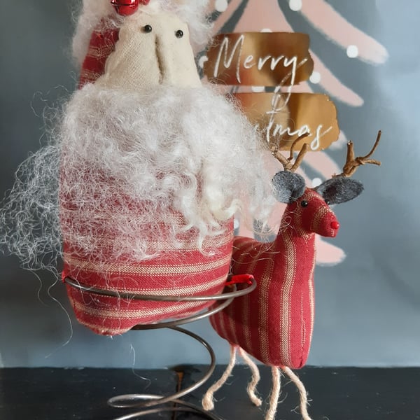 CHRISTMAS FOLKLORE SANTA & REINDEER BED SPRING ORNAMENT