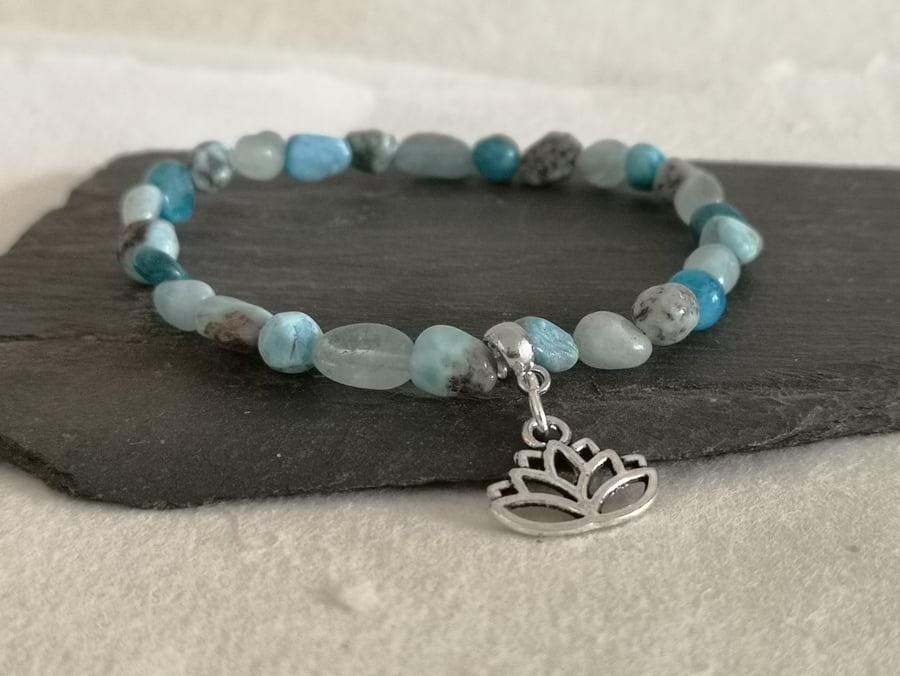 Throat chakra bracelet of blue larimar, apatite and aquamarine with lotus flower