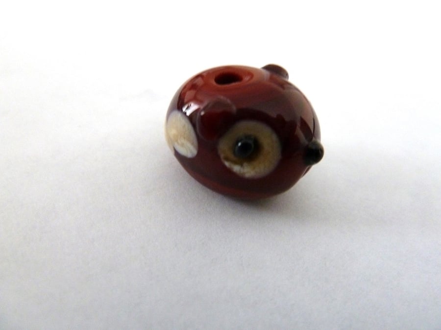 brown guinea pig lampwork bead