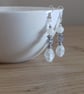CRYSTAL, WHITE AND SILVER DANGLE EARRINGS. - Image 2