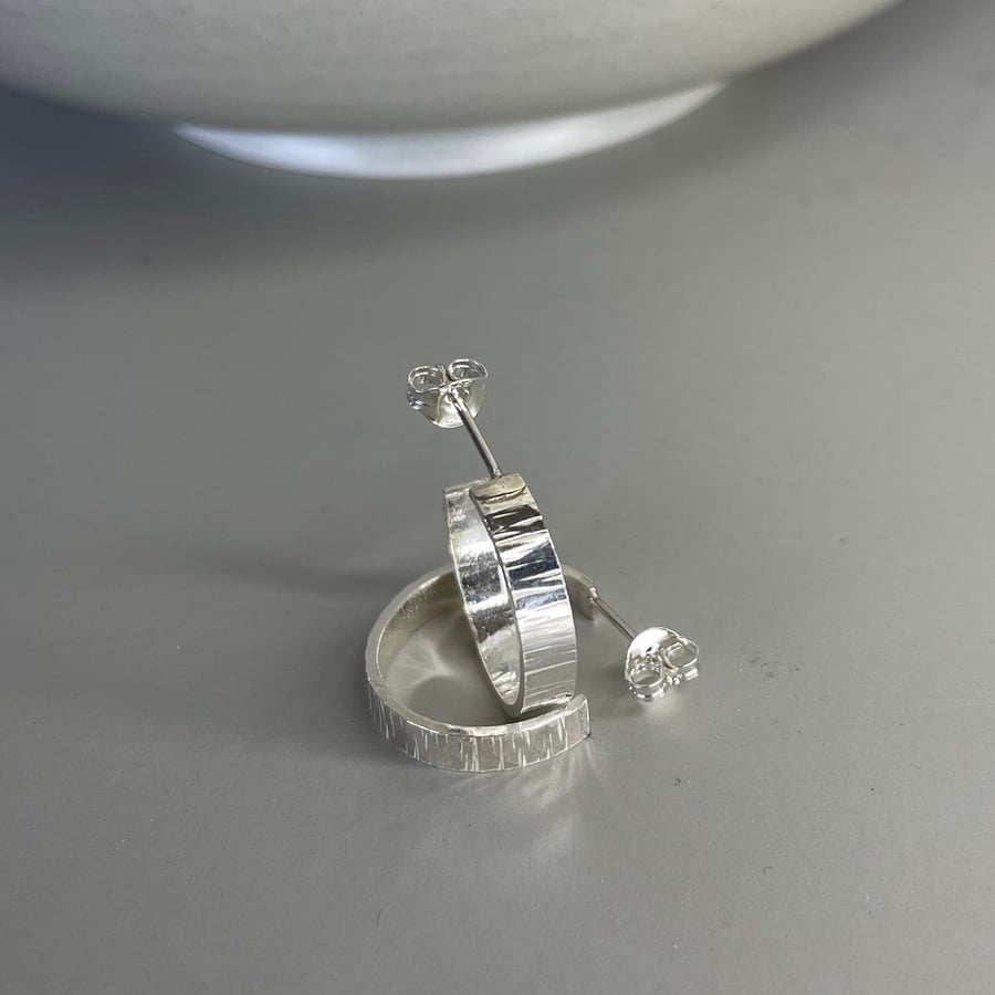 Sterling silver narrow medium sized hammered bark texture hoop earrings