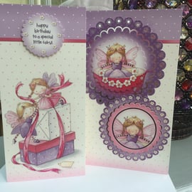 Pretty little fairy and presents birthday card