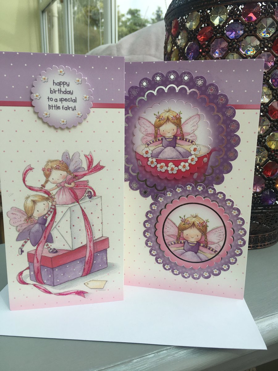 Pretty little fairy and presents birthday card
