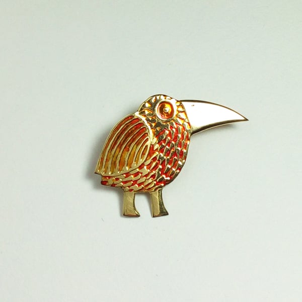 Orange bird brooch
