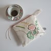 Make up bag,  purse or pouch with pastel vintage embroidery 