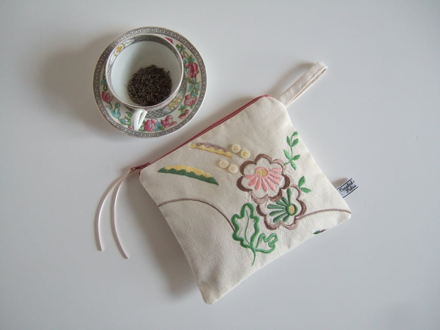 Make up bag,  purse or pouch with pastel vintage embroidery 