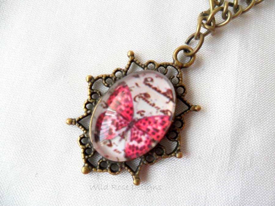Fuschia butterfly pendant necklace 