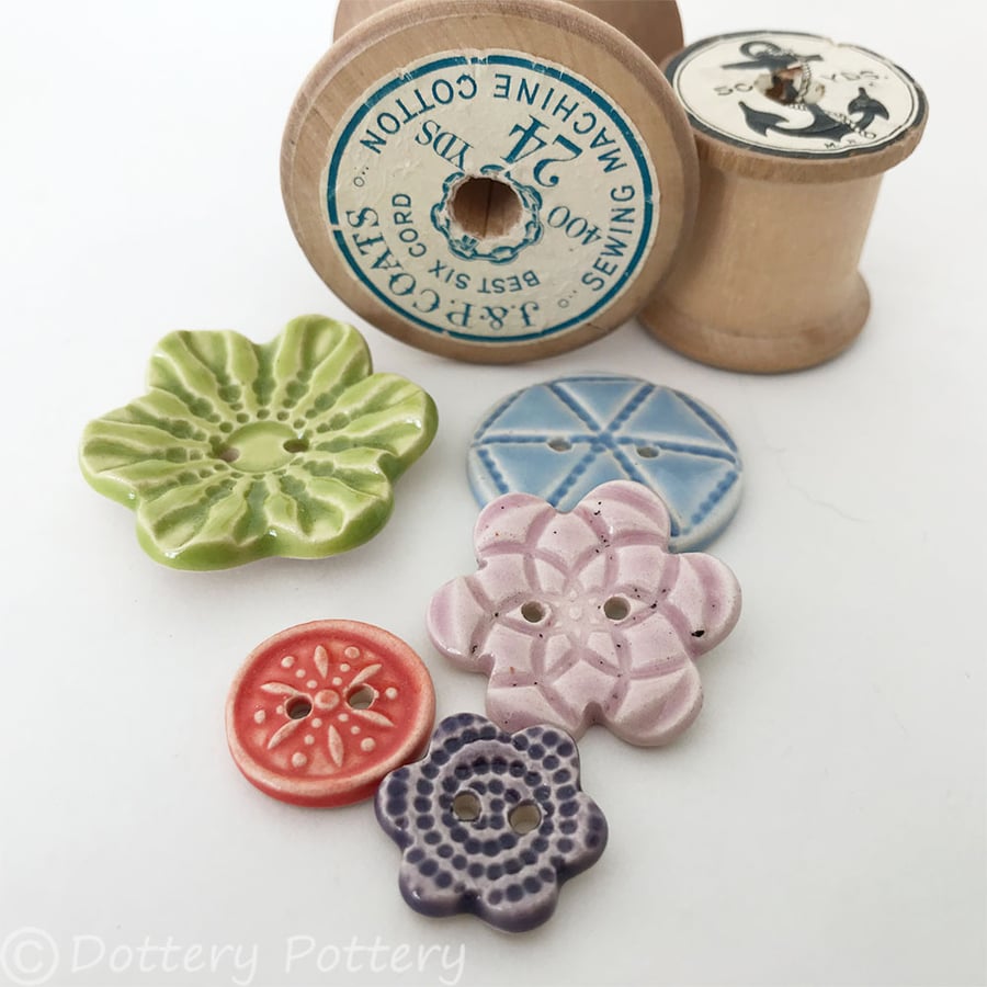 Set of five various ceramic handmade buttons