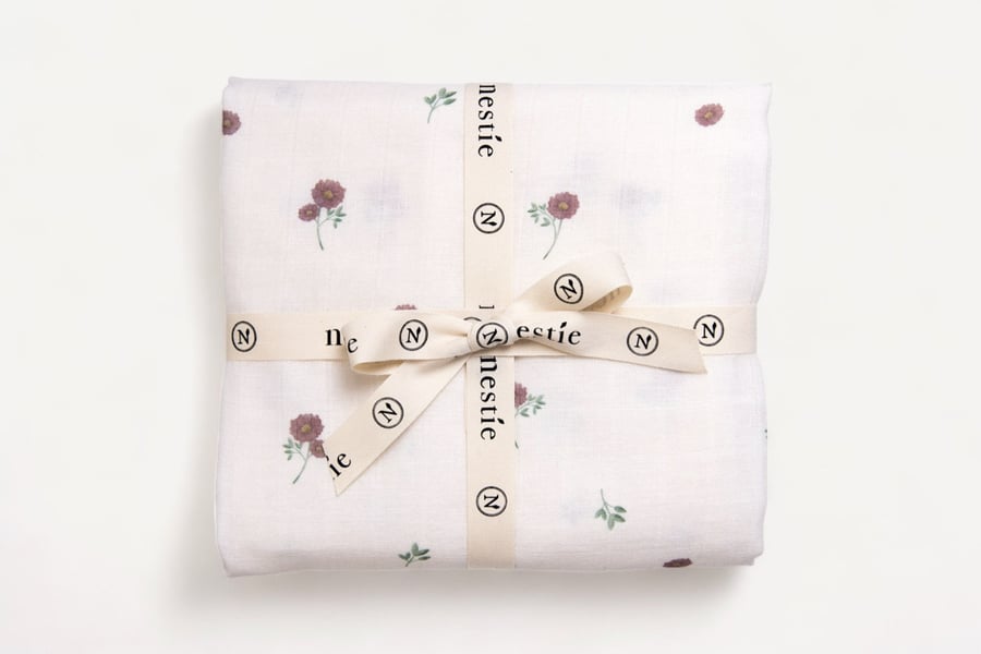 Two Layer Muslin Baby Blanket and Swaddle in our delicate Nestie Meadow Theme.