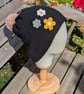 Black Crochet Beanie Hat with decorative flowers  - Image 1
